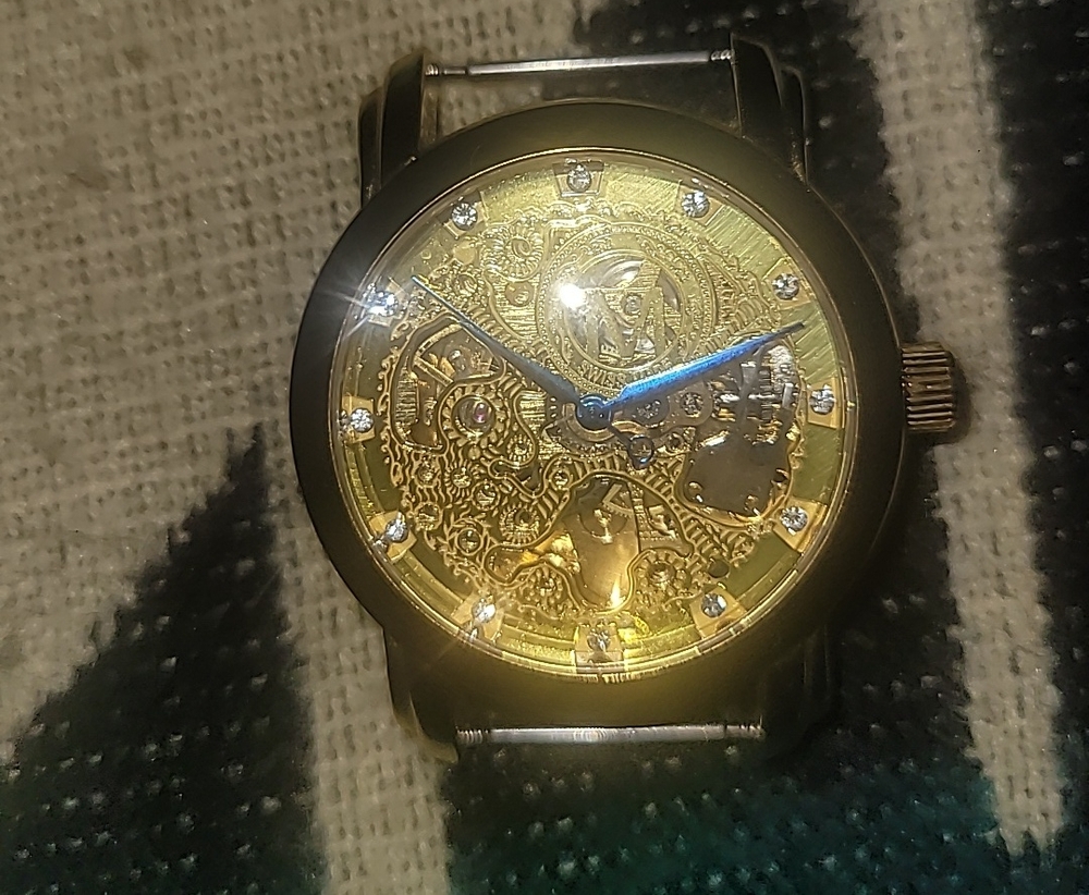 Elegant Gold Skeleton Dial Men's Watch